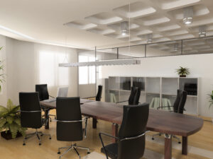 Empty meeting room of a modern office with swivel chairs and a long desk